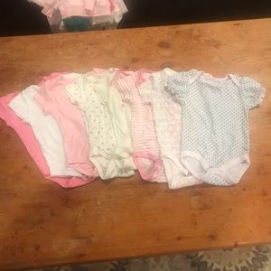 8 pieces Onesies 6-9month Girl Like New